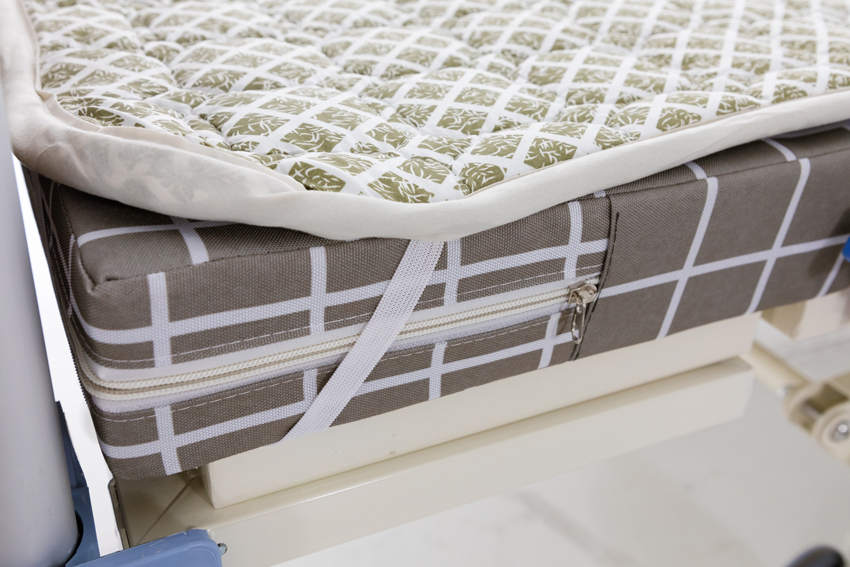 Chránič matrace na polohovací postel s toaletou Multibed a Home