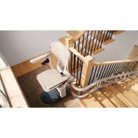 Židlový výtah Unizdrav se zatočenou kolejnicí