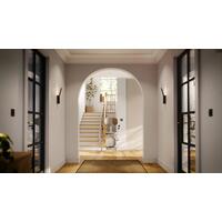 Židlový výtah Unizdrav se zatočenou kolejnicí