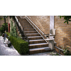 Židlový výtah Unizdrav se zatočenou kolejnicí