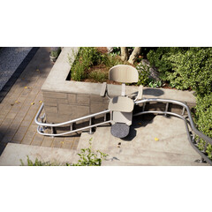 Židlový výtah Unizdrav se zatočenou kolejnicí