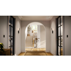 Židlový výtah Unizdrav se zatočenou kolejnicí