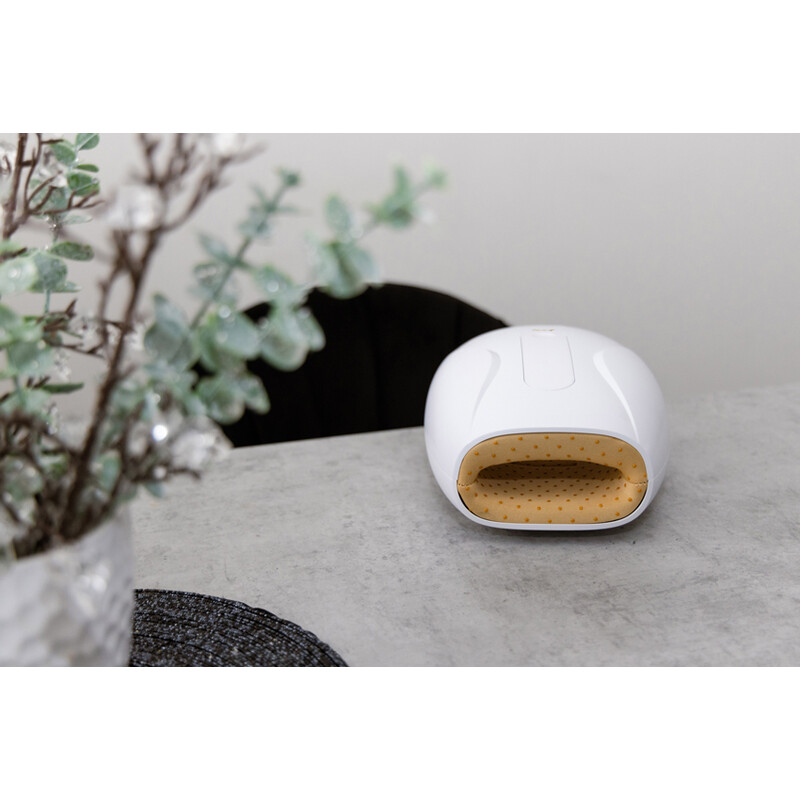 Elektrický masážní přístroj pro terapii rukou