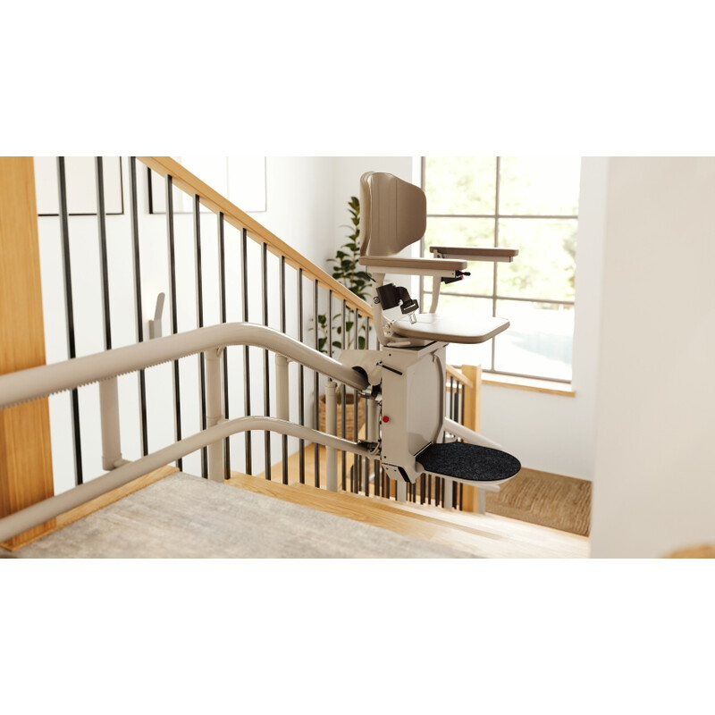 Židlový výtah Unizdrav se zatočenou kolejnicí