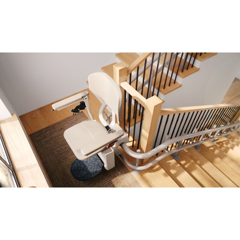 Židlový výtah Unizdrav se zatočenou kolejnicí