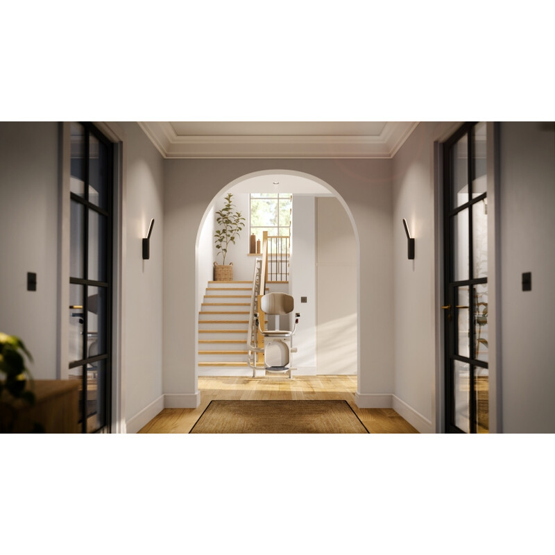 Židlový výtah Unizdrav se zatočenou kolejnicí