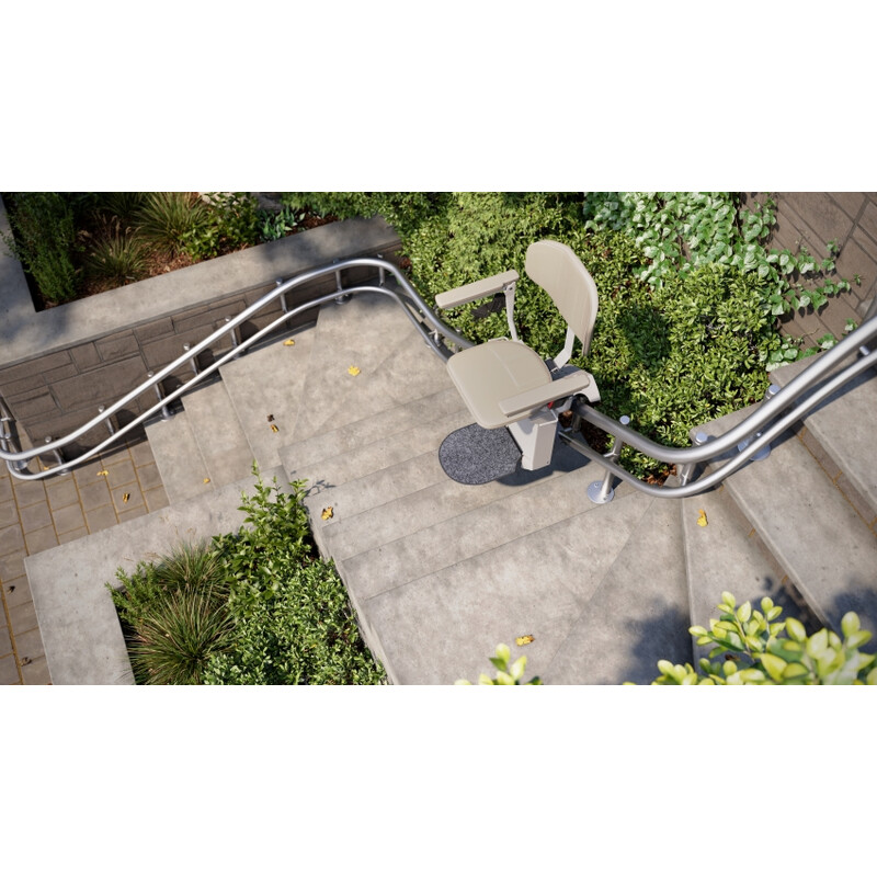 Židlový výtah Unizdrav se zatočenou kolejnicí